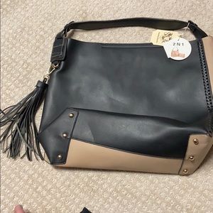 Beige and black bag.  Never used.
